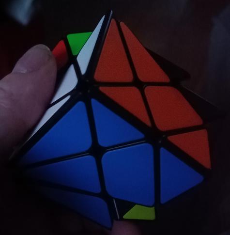 Solved side of an unsolved Axis cube