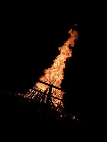 A bonfire lit in the night