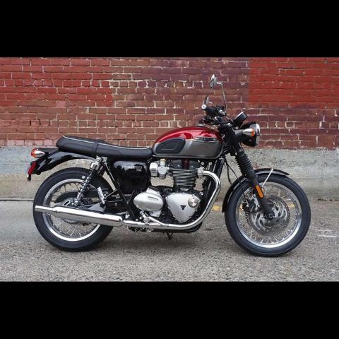 Photo by Neil E. Hodges on September 10, 2021. May be an image of motorcycle, outdoors and brick wall.