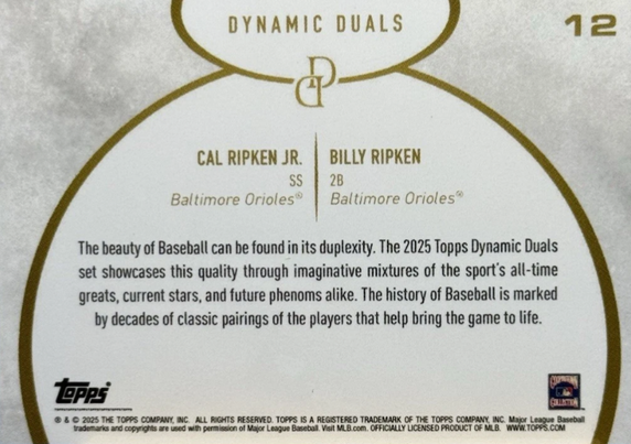 Card of the Ripkens reads:

The beauty of Baseball can be found in its duplexity.

(And then more boring text that I won't bore you with.)