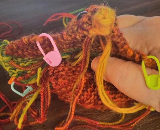 All the ends on the inside, dangling. No weaving in, just declare them stuffing
