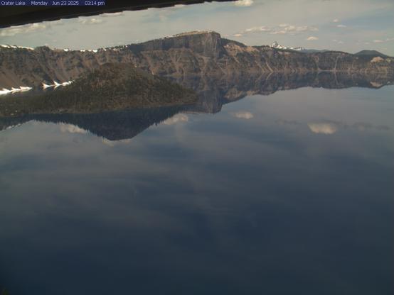 Is Crater Lake visible today? Sometimes the lake is hidden by clouds, especially in the winter. This view looks north across the lake from the Sinnott Overlook at Rim Village (elevation 7,100 feet). On a clear day, it takes in Wizard Island, Llao Rock, and Mount Thielsen. Image updates every 4 to 6 minutes.