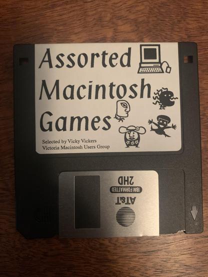 Photo of a floppy disk whose label reads:

Assorted Macintosh Games
Selected by Vicky Vickers
Victoria Macintosh Users Group