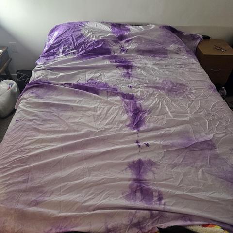 the fitted sheet: mostly pale purple with darker purple showing up occasionally, mostly at the top and some in the middle