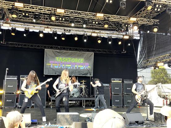 The band "Taskforce Toxicator" live on stage at Metal Frenzy Open Air festival.