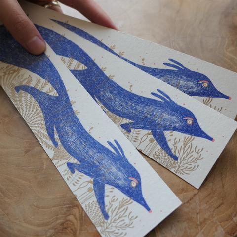 marque-pages illustrés avec un renard bleu et des détails dorés.