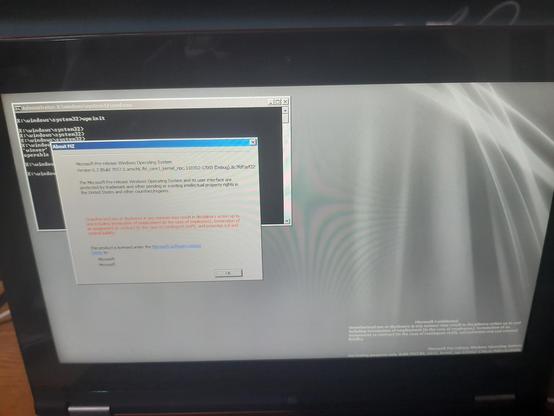 picture of a lenovo ideapad yoga 11 running windows 8 build 7957 (check/debug, armv7) winpe

this build uses the classic theme, something which was removed not long afterwards

a version dialog is active, with cmd.exe underneath