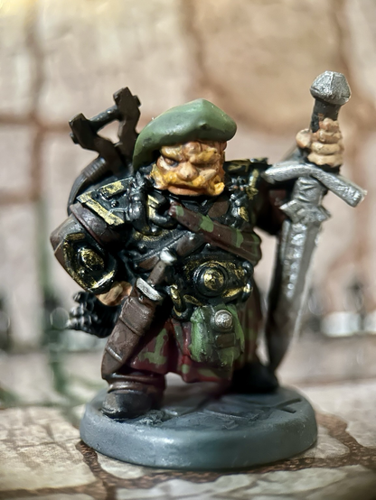 Dwarf miniature. He carried a large sword and a dagger with a crossbow on his back.