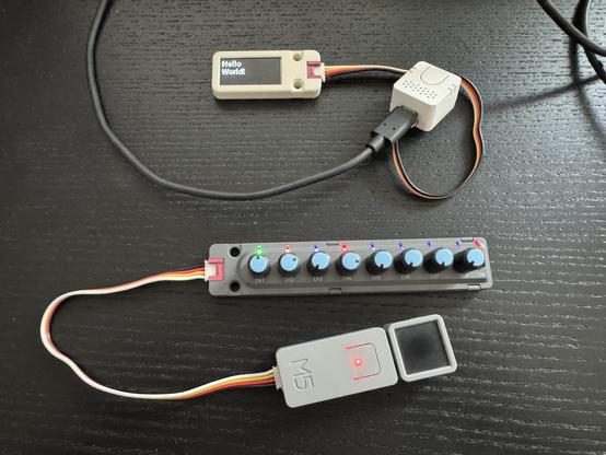 An M5Stack Atom Echo attached to an M5Stack OLED display
An M5Stack Atom Matrix, powered by an M5Stack TailBat battery attached to an M5Stack 8Angle strip of potentiometers with LED lights indicating their position