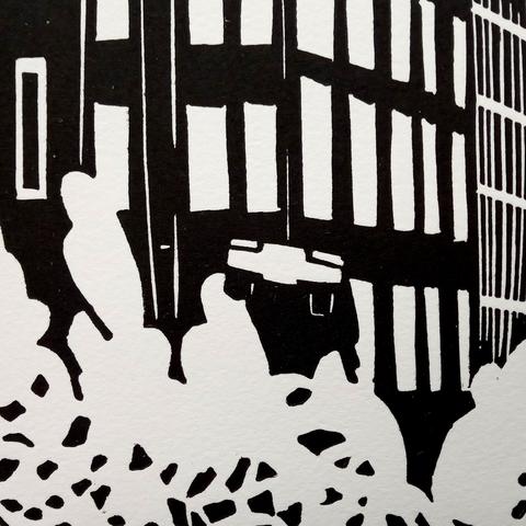 Détail de ladite linogravure : la voiture qui vole au dessus du nuage de l'explosion.