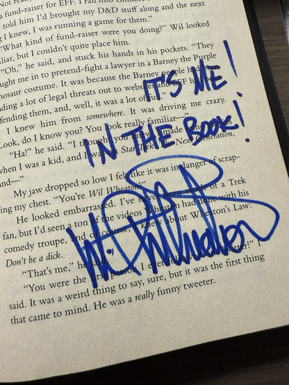 Wil Wheaton’s autograph on page 29 of the book Homeland.