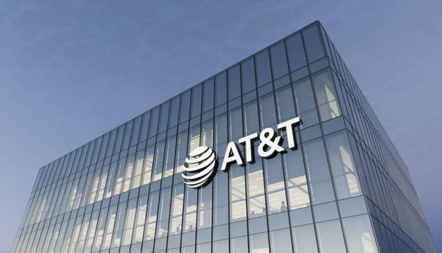 AT&T Corporation Signage Logo on Top of Glass Building. Workplace Telecommunication Com.