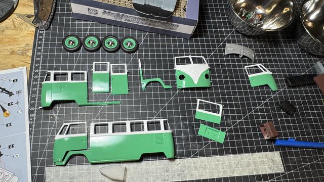 Painted parts of a Volkswagen T1 Samba Bus Flower Power by Revell in 1:24