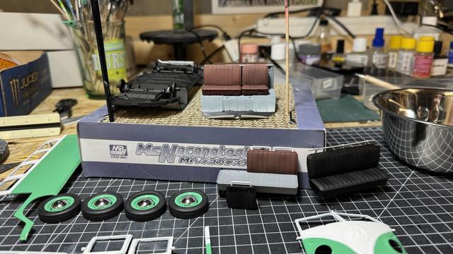 Painted parts of a Volkswagen T1 Samba Bus Flower Power by Revell in 1:24