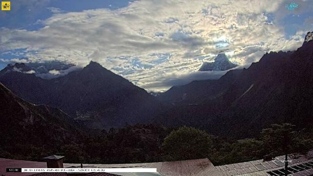 A wide view of several mountains, from left:

- Taboche (6,500 meters/21,325 feet)
- Mount Everest (8,848 meters/29,032 feet)
- Lhotse (8,516 meters/27,939 feet)
- Ama Dablam (6,814 meters/22,355 feet)