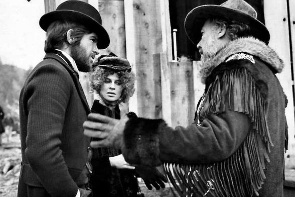 Warren Beatty, Julie Christie and Robert Altman on the set of McCABE AND MRS. MILLER (1971).