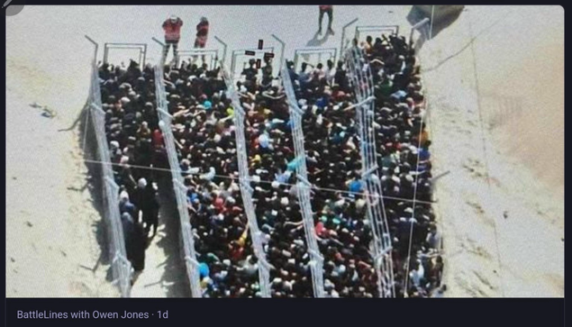 Starving Palestinian civilians herded into pens in a field in Gaza by US and Israeli soldiers