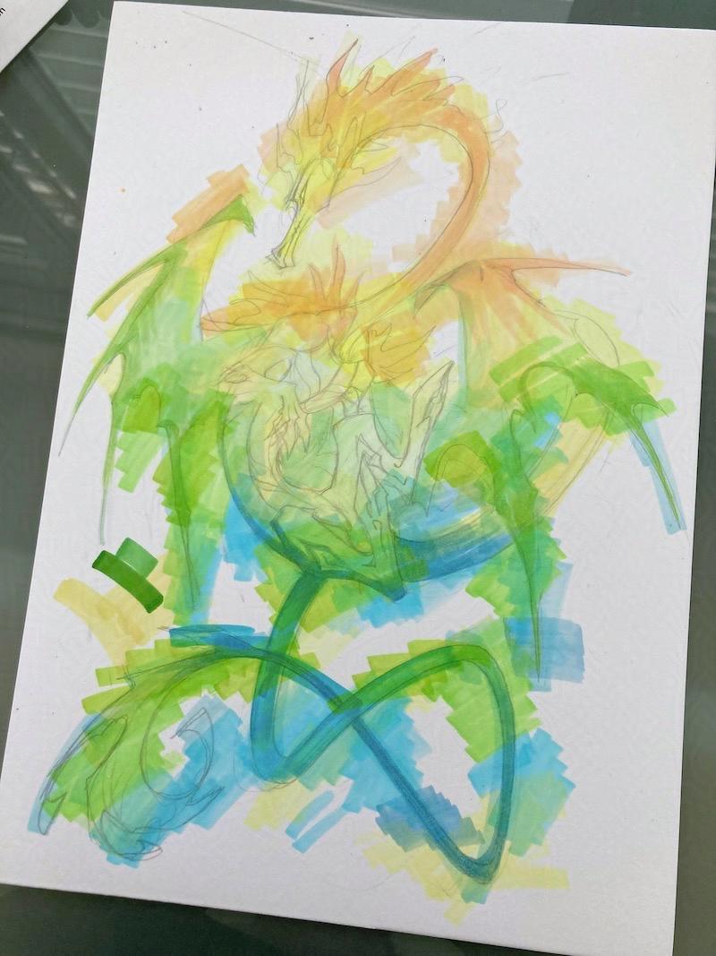 dragon doodle on colour test paper