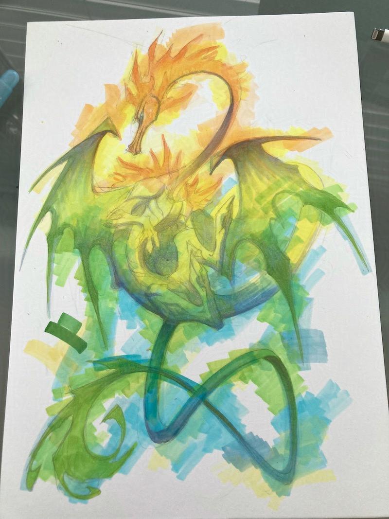 dragon doodle on colour test paper