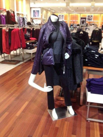 A store dummy but one arm appears four foot long and can touch the knee when bent at the elbow