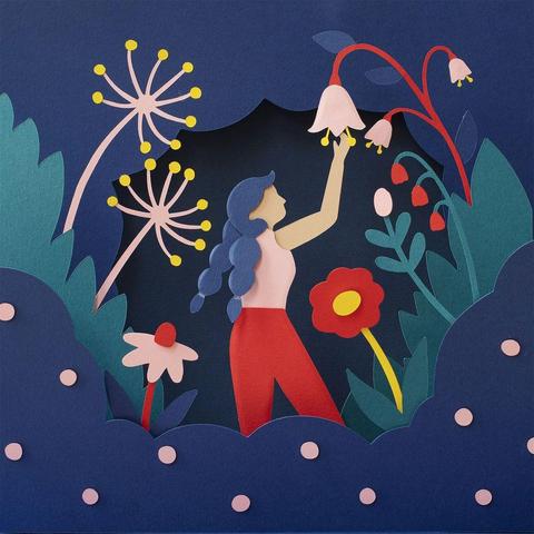 A paper craft illustration featuring a woman with blue hair reaching for a flower amid vibrant, layered paper cut-outs of plants and flowers against a dark blue background.