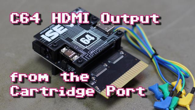 Thumbnail for my video, showing an ISEVIC cartridge on my workbench with two PCBs stacked on top of each other and three wires with IC connectors hooked up to the cartridge. The overlayed text reads "C64 HDMI Output from the Cartridge Port".