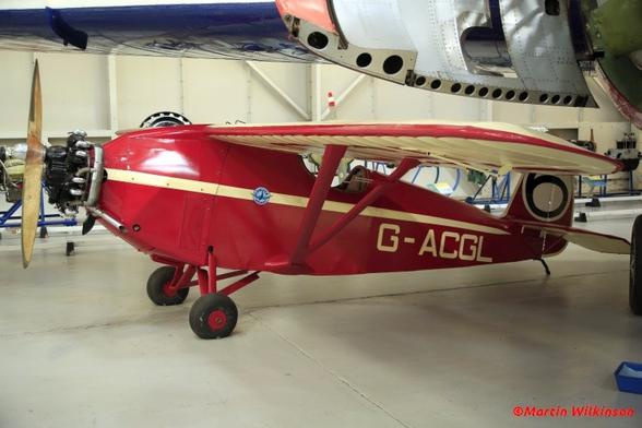 Comper Swift on display in the hangar at RAF Museum Cosford