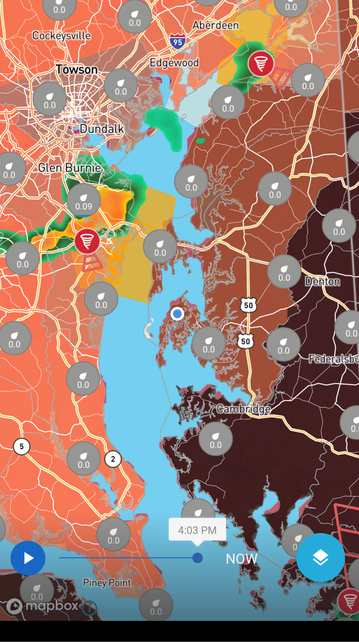 Screenshot of a Weather Underground map, showing various color shades of heat watched/ warnings, along with scattered pop up storm cells showing radar indicated rotation .
