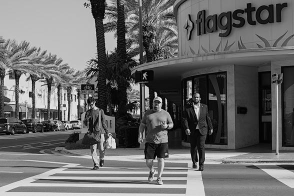People crossing the street in B&W