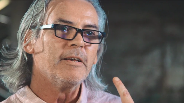 Patrick Maguire, pictured here as a grown man with long silver hair and glasses, was only 13 when he was arrested.