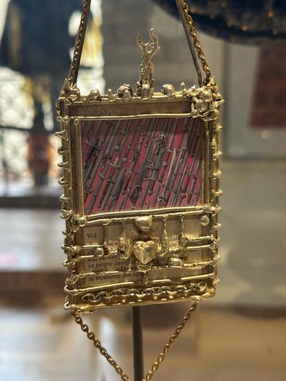 A golden reliquary for magic card “mur d’epees”. All of these were made by Youri Johnson