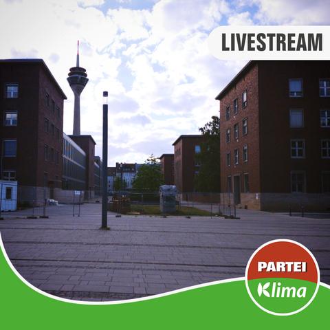 Ein spontaner Schnappschuss des Jürgensplatzes zeigt auf der linken Seite das Polizeipräsidium, auf der rechten Seite einige Häuser und im Hintergrund in der Ferne den Rheinturm.