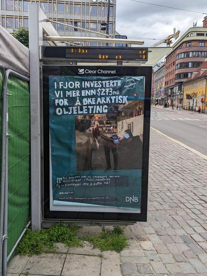 An adshel with a DNB poster which has been subvertized to read "I fjor investerte vi mer enn $273mil for å øke arktisk oljeleting" and below "opp til aug.2024 har vi investert mer enn $2 milliarder i fossilindustrien. Og vi planlegger ikke å slutte nå!" And then "check out the "Banking on thin ice" report for more info"

The slogan of the ad, which was ung milliarden, has also been changed into CO2 milliarder.

The central picture of a girl reading a book in a living room with a car parked there has been edited so that the girl wears a regular blue medical mask and the book she's reading is the brochure about handling of catastrophes distributed by the Oslo commune some time ago.