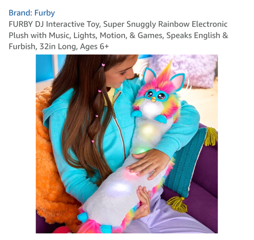A screen shot from Amazon showing a child lovingly cradling a brightly colored DJ Furby with colorful lights glowing from within its elongated torso.