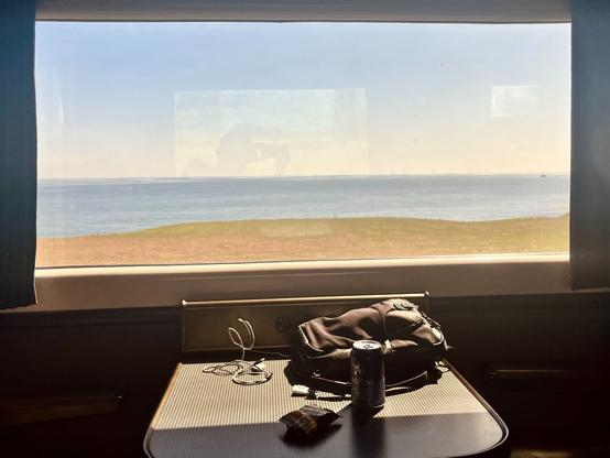 View on the sea through a train window