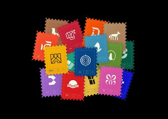 A colorful assortment of postage stamp designs featuring various logos and symbols, arranged artistically on a black background.