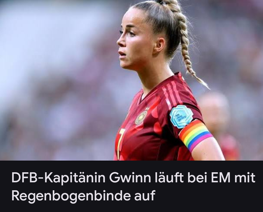 Ein Foto. Giulia Gwinn, Kapitänin der Frauen Nationalmannschaft, mit einer Regenbogenbinde