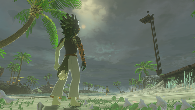Wolf Link wearing no shirt and white pants standing on a beach with back to the camera looking out at the horizon with cloudy skies