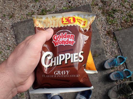 Photo of me holding a bag of gravy potato snacks. Proper excited to see these in the shop. Gravy flavour snacks, top level snackage!