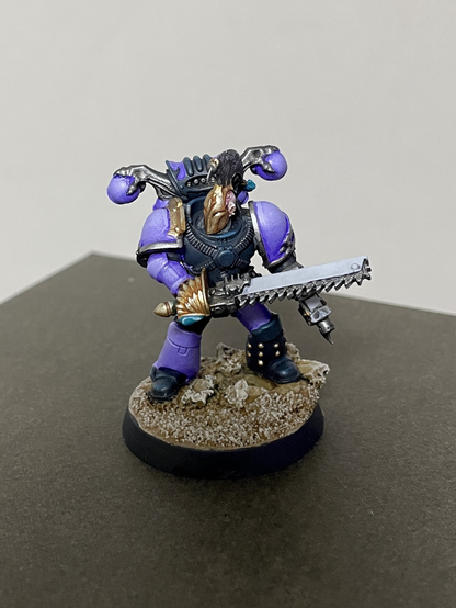 Purple space marine with a gold mask
