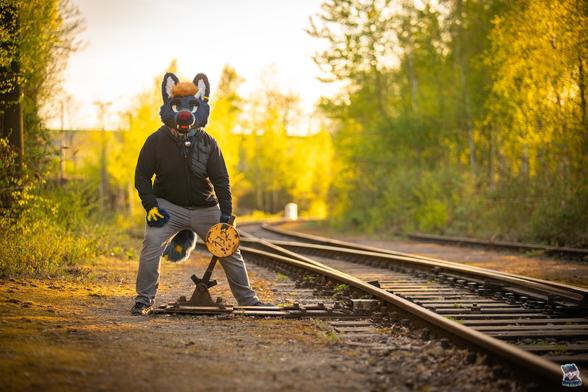 Me in partial suit, about to set a railroad switch.