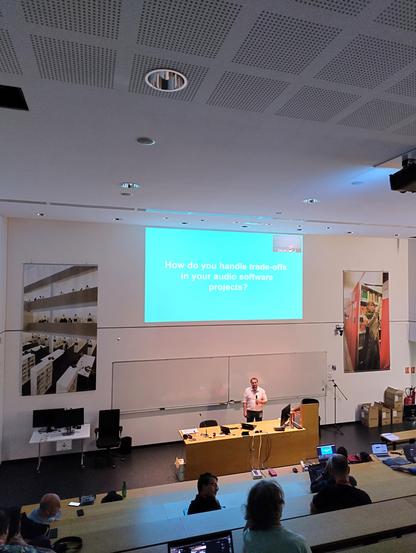 Photo of thisven taking questions after his talk "Composing Resilient Software: Architectural Evolution and Collaborative Governance in JackTrip's Open-Source Journey".