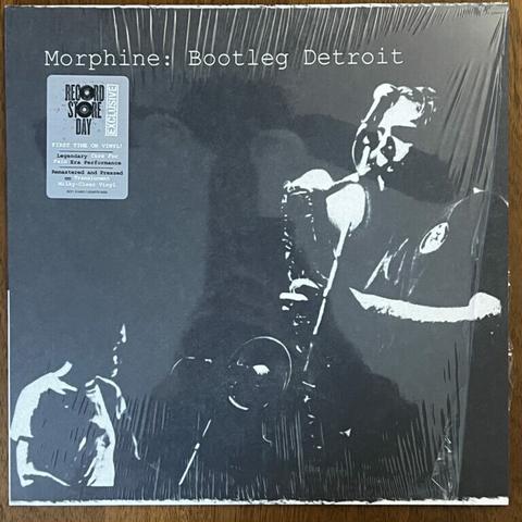 Morphine: Bootleg Detroit front cover, featuring a very contrasted black and white photograph of two band members, Mark Sandman presumably on bass though it's not visible in this shot, and Dana Colley on saxophone