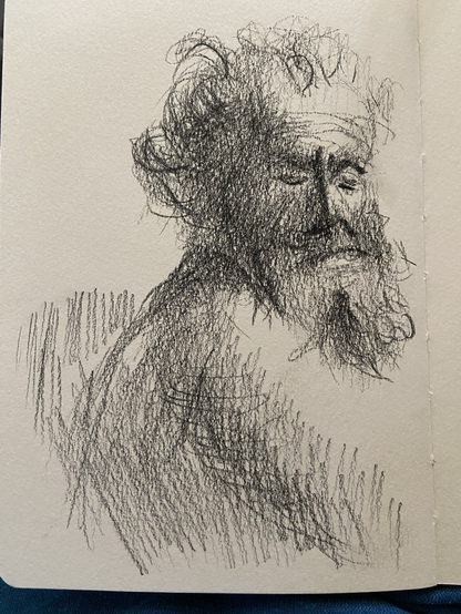Kopie einer Radierung von Rembrandt mit schwarzem Buntstift.Bärtiger Mann mit Stirnfalten.