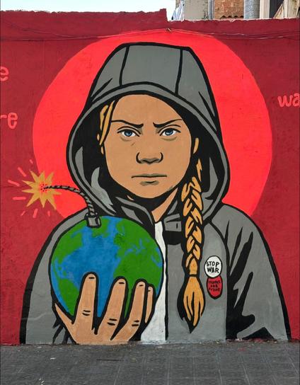 Street art mural of climate activist Greta Thunberg wearing a hooded grey jacket, holding a small Earth in her hand like a lit bomb with a fuse, symbolizing the urgency of the climate crisis. A red glowing background creates a halo effect, intensifying the warning. Greta’s expression is serious and determined. Her jacket features two activist pins reading “STOP WAR” and “FRIDAYS FOR FUTURE.” The mural communicates a powerful message about the state of the planet being passed to younger generations like a ticking time bomb.