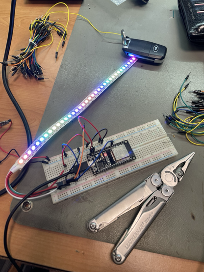 Breadboard with ESP32 on it controling a 36 RGB LED strip