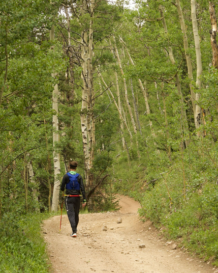 Man hiking on a dirt road