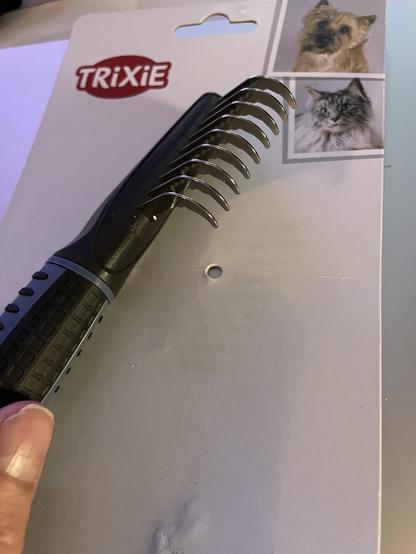 Kissojen/koirien pitkän turkin käyräpiikkinen selvitysharja, ”Trixie”