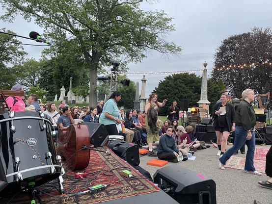 View of two stages facing each other amidst grave obelisks