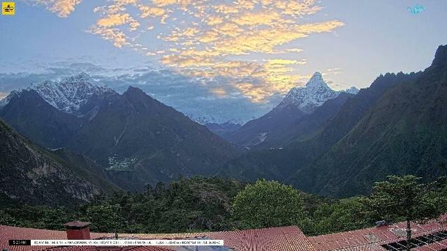 A wide view of several mountains, from left:

- Taboche (6,500 meters/21,325 feet)
- Mount Everest (8,848 meters/29,032 feet)
- Lhotse (8,516 meters/27,939 feet)
- Ama Dablam (6,814 meters/22,355 feet)